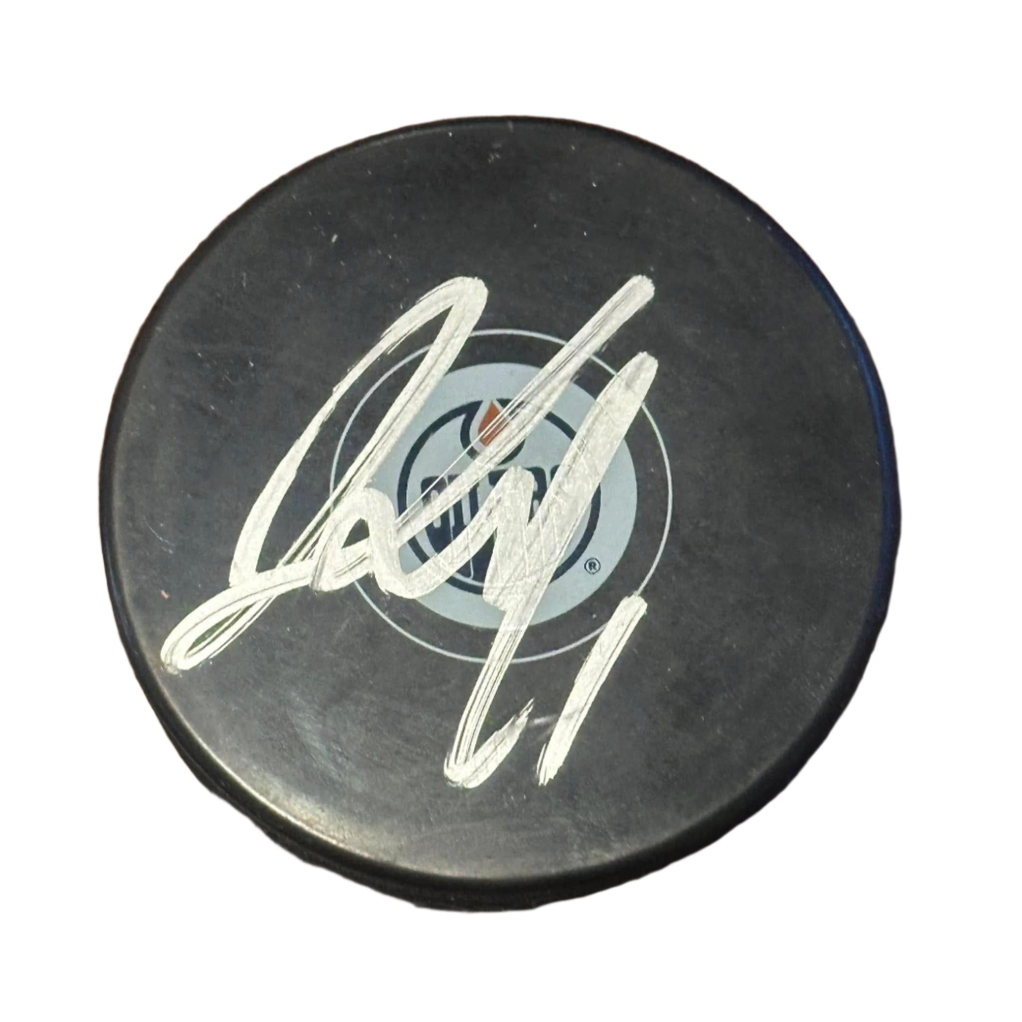 Jeff Skinner Autographed Edmonton Oilers Logo Puck.-Right Off The Field