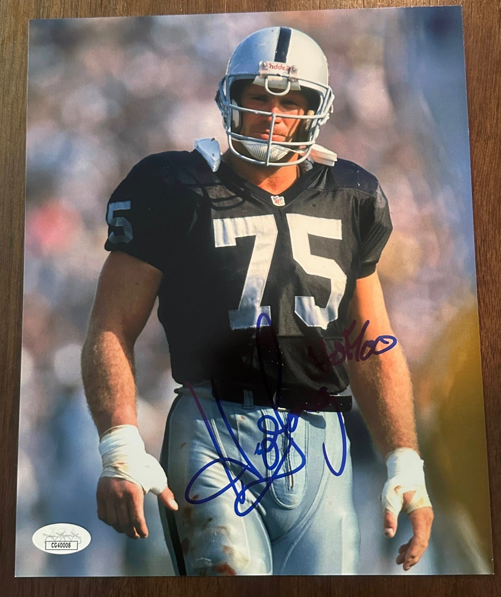 Howie Long Autographed 8x10 Photo JSA COA 'HOF 00' Inscription Oakland Raiders-Right Off The Field
